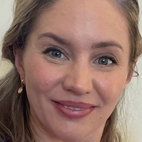 Katie Leveson (She/Her)